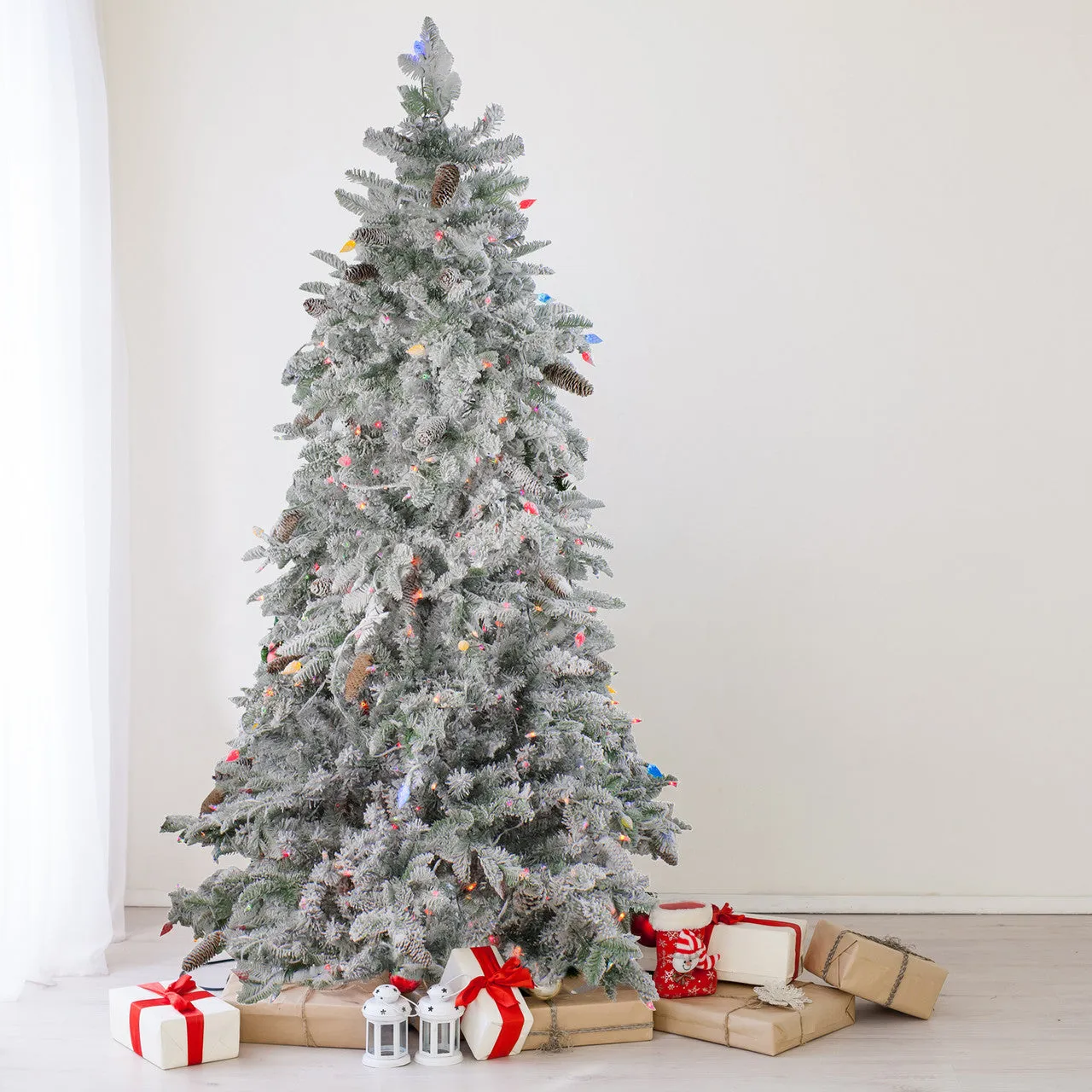 6.5' Pre-Lit Flocked Dunton Spruce Slim Artificial Christmas Tree - Multi Lights