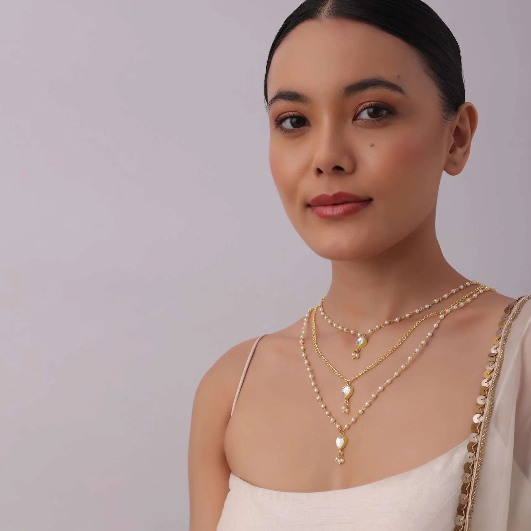 Gold Finish Layered Kundan Necklace With Pearl Drops